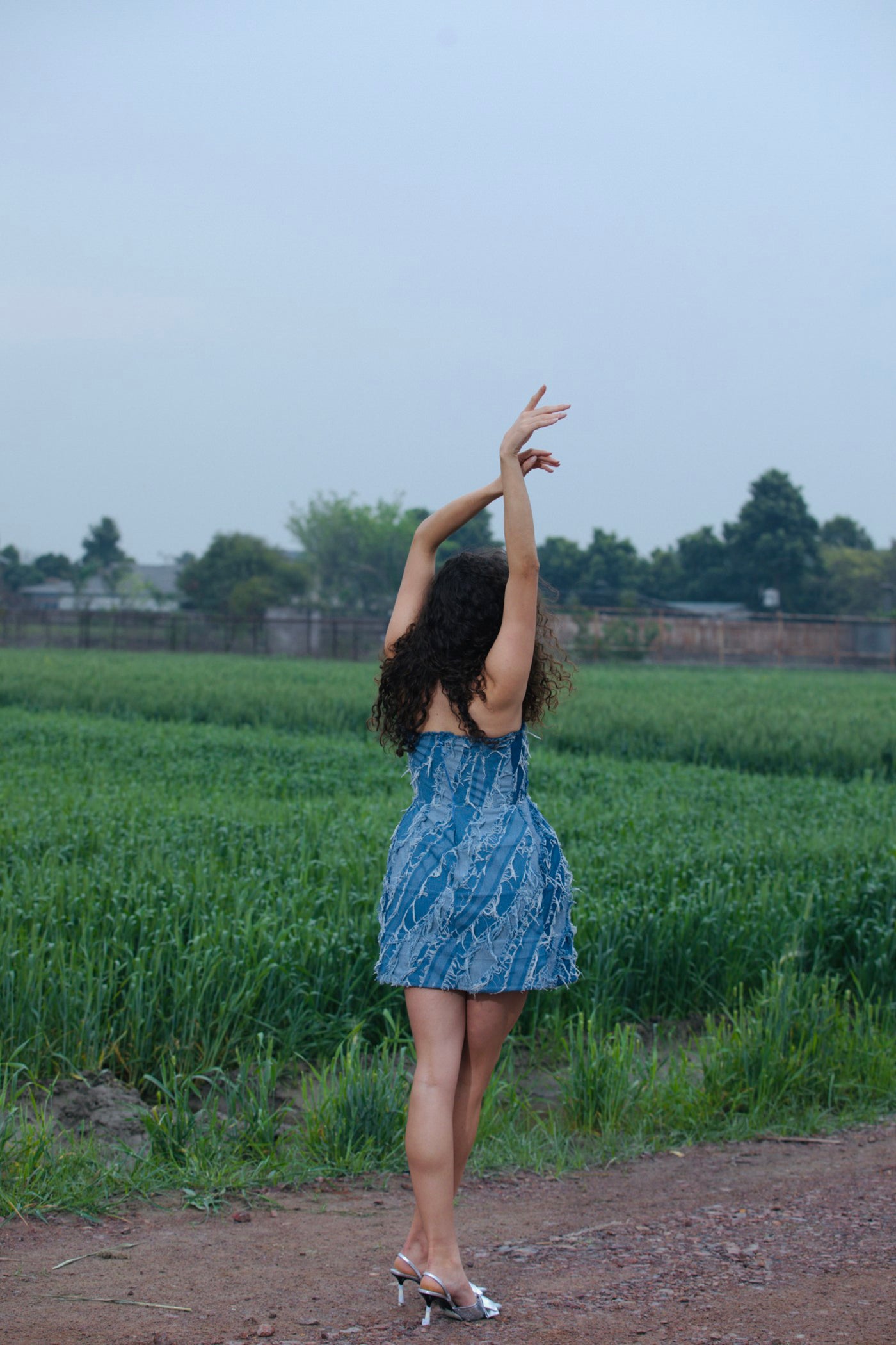 CRUNK LIGHT BLUE WASH FRINGED DENIM MINI DRESS